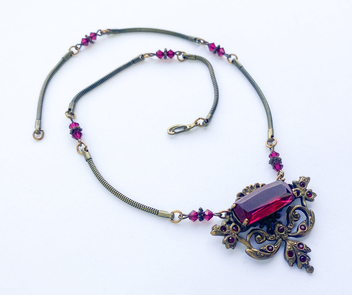 1940s Red Glass Pendant Necklace | Bronze Coil Chain